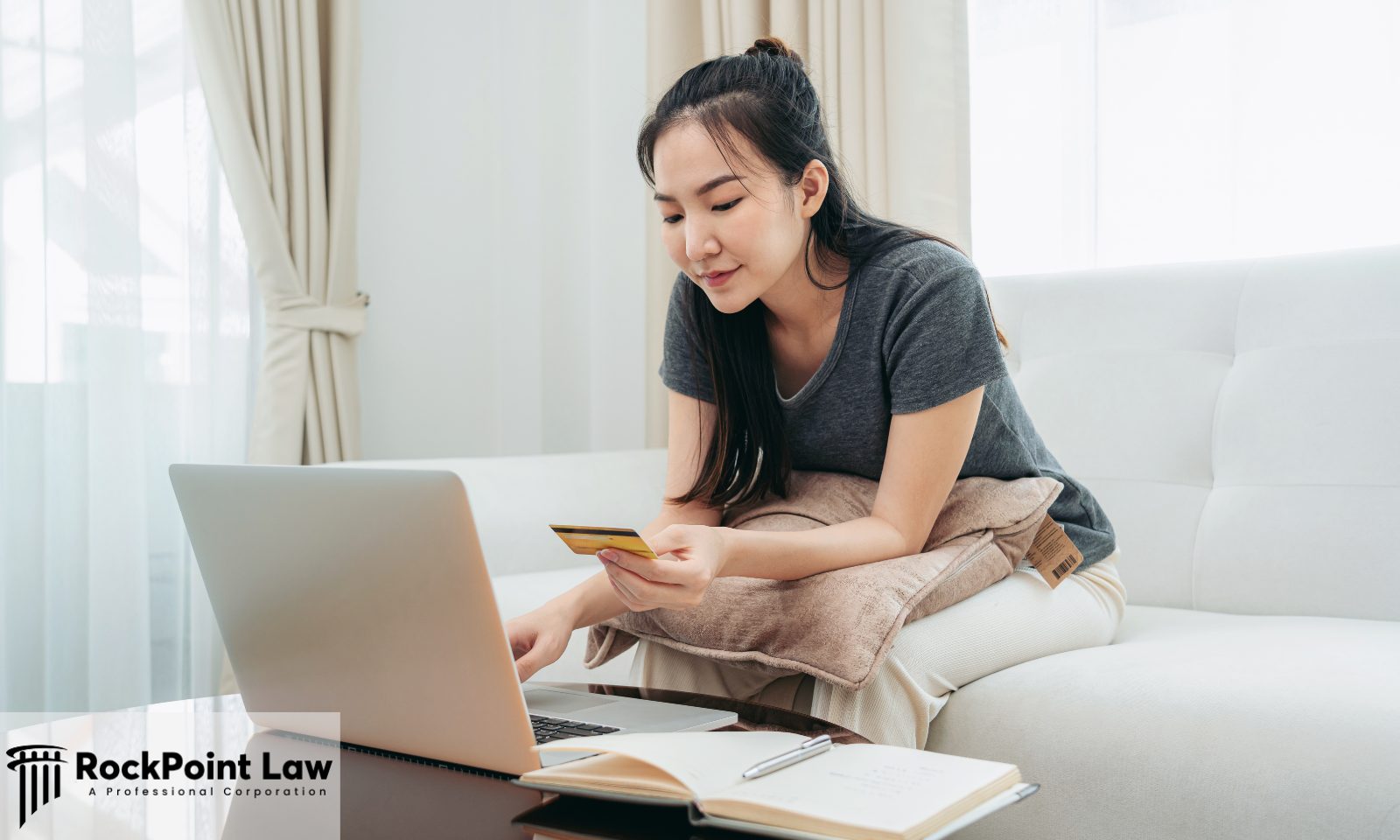 Person using a laptop and checking recalls information