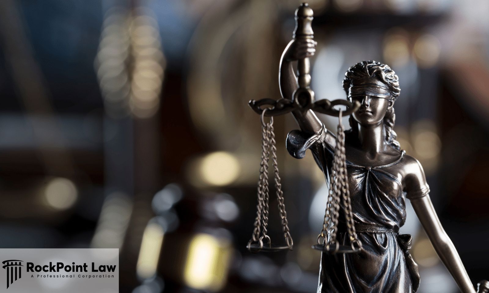 Lady Justice statue representing legal remedies available if a Georgia Lemon Law claim is denied.