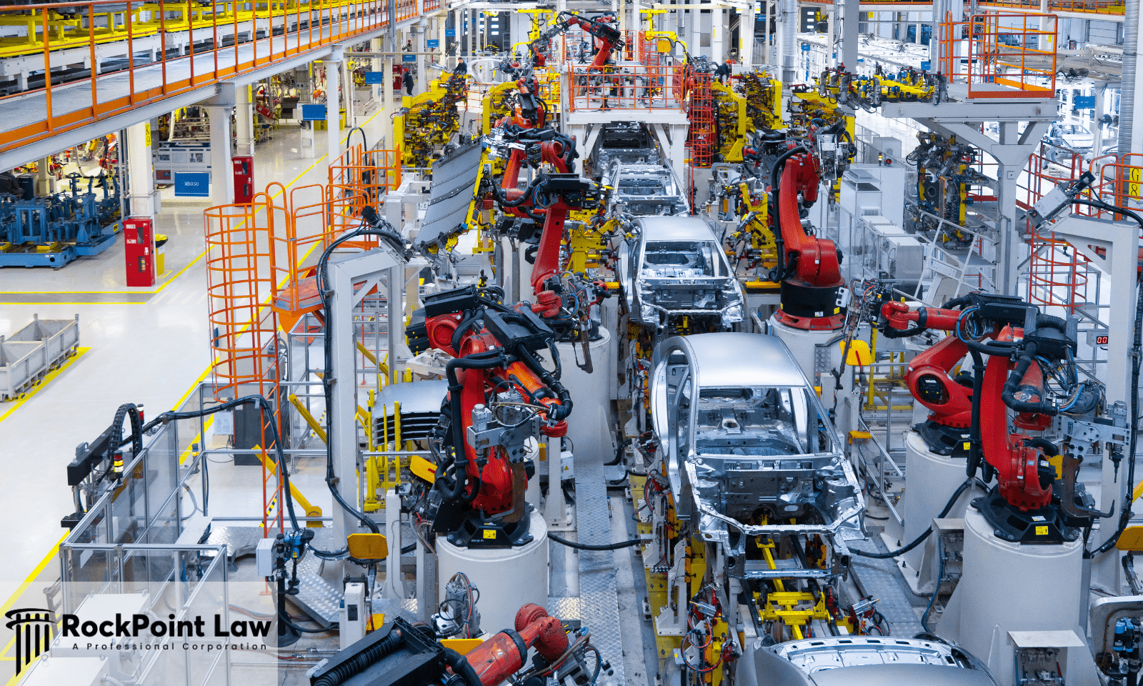 Robotic assembly line producing vehicles in an automobile manufacturing plant relevant to Lemon Law claims.