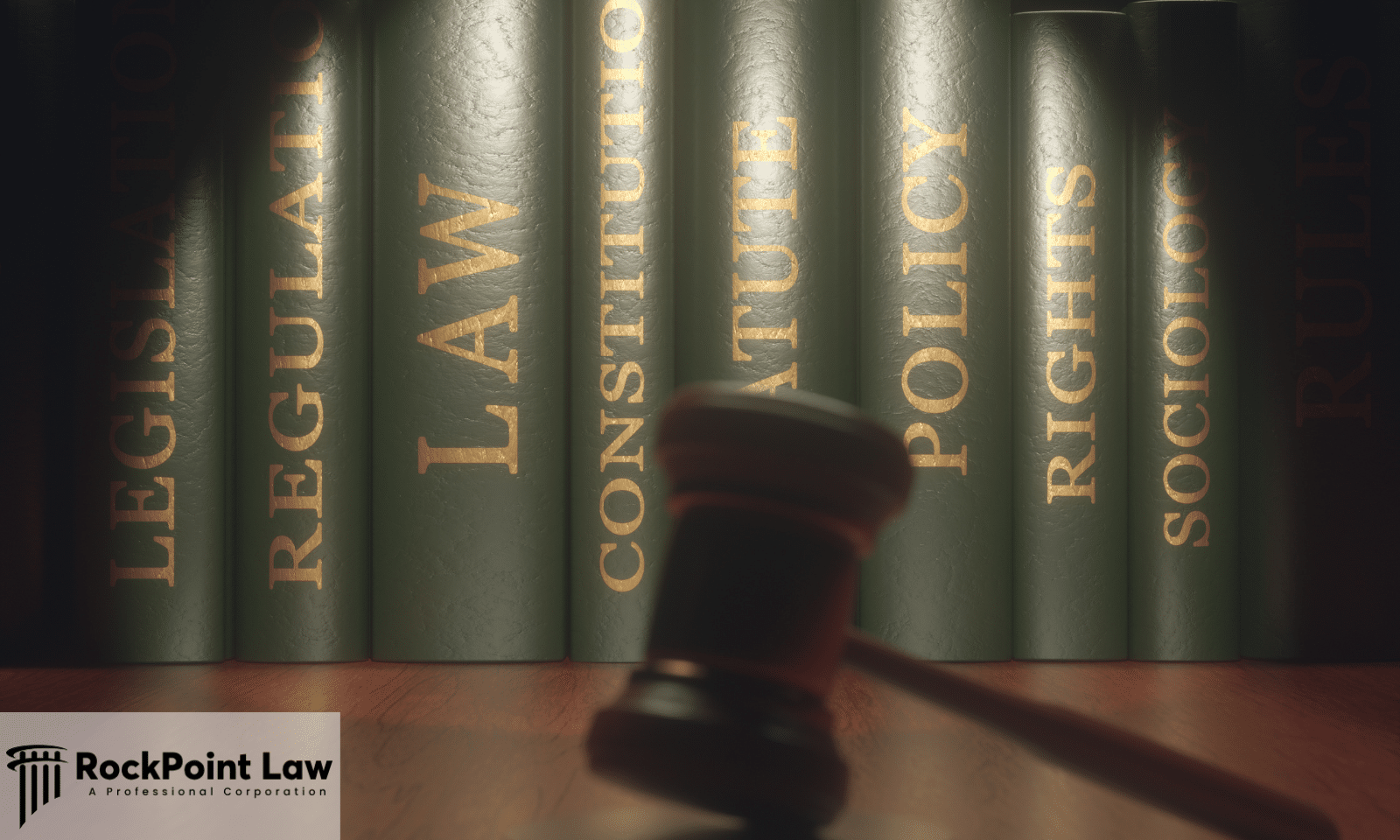Law books labeled with legal topics and a judge's gavel, representing Lemon Law, consumer protection, and legal rights.