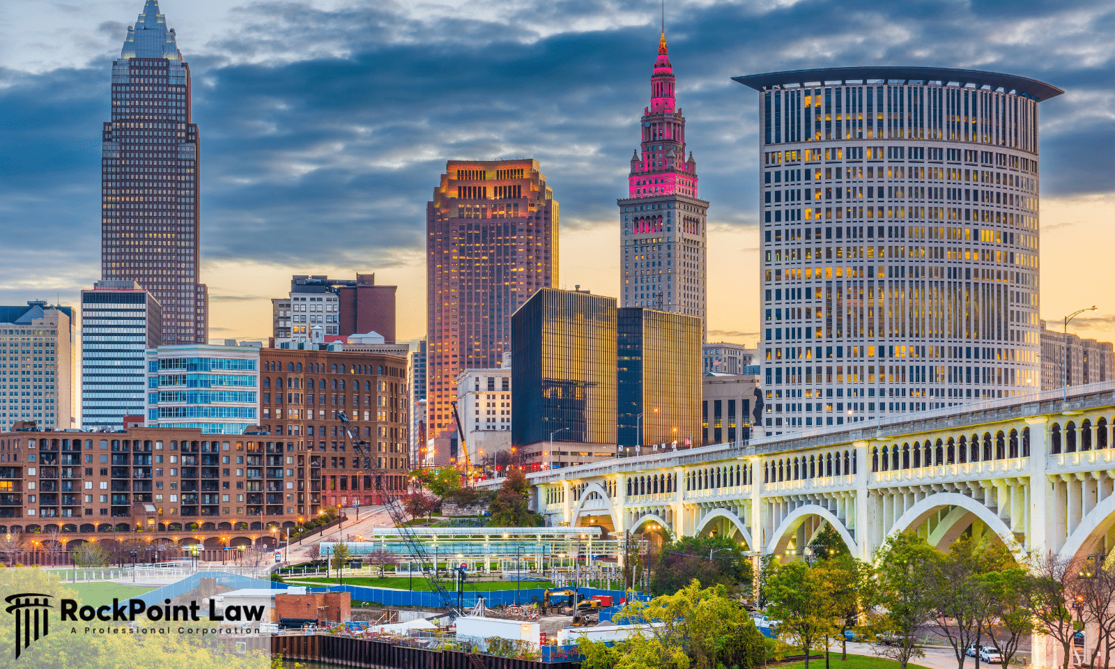 The Cleveland, Ohio skyline at dusk with the Detroit-Superior Bridge over the river, illustrating a guide to Ohio lemon law.
