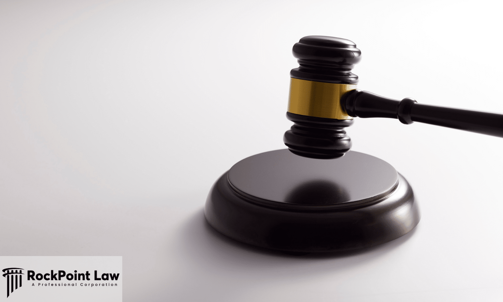A judge's gavel resting on its block against a plain background, representing Ohio lemon law case examples.