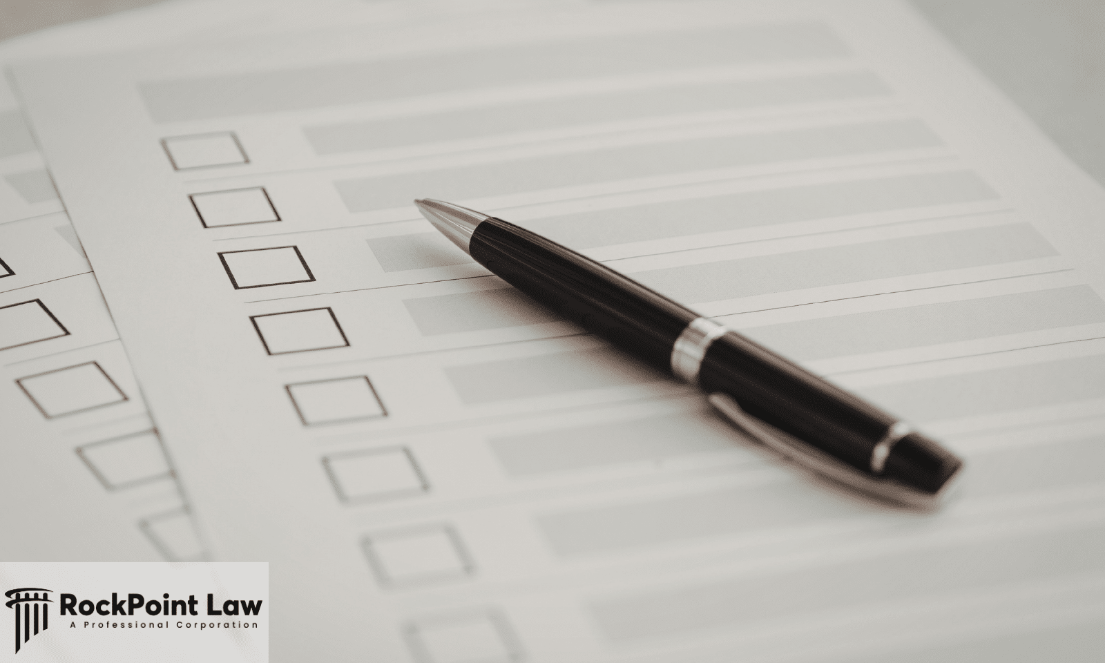 Printed checklist and pen representing the repair orders and records needed for an Oregon lemon law claim