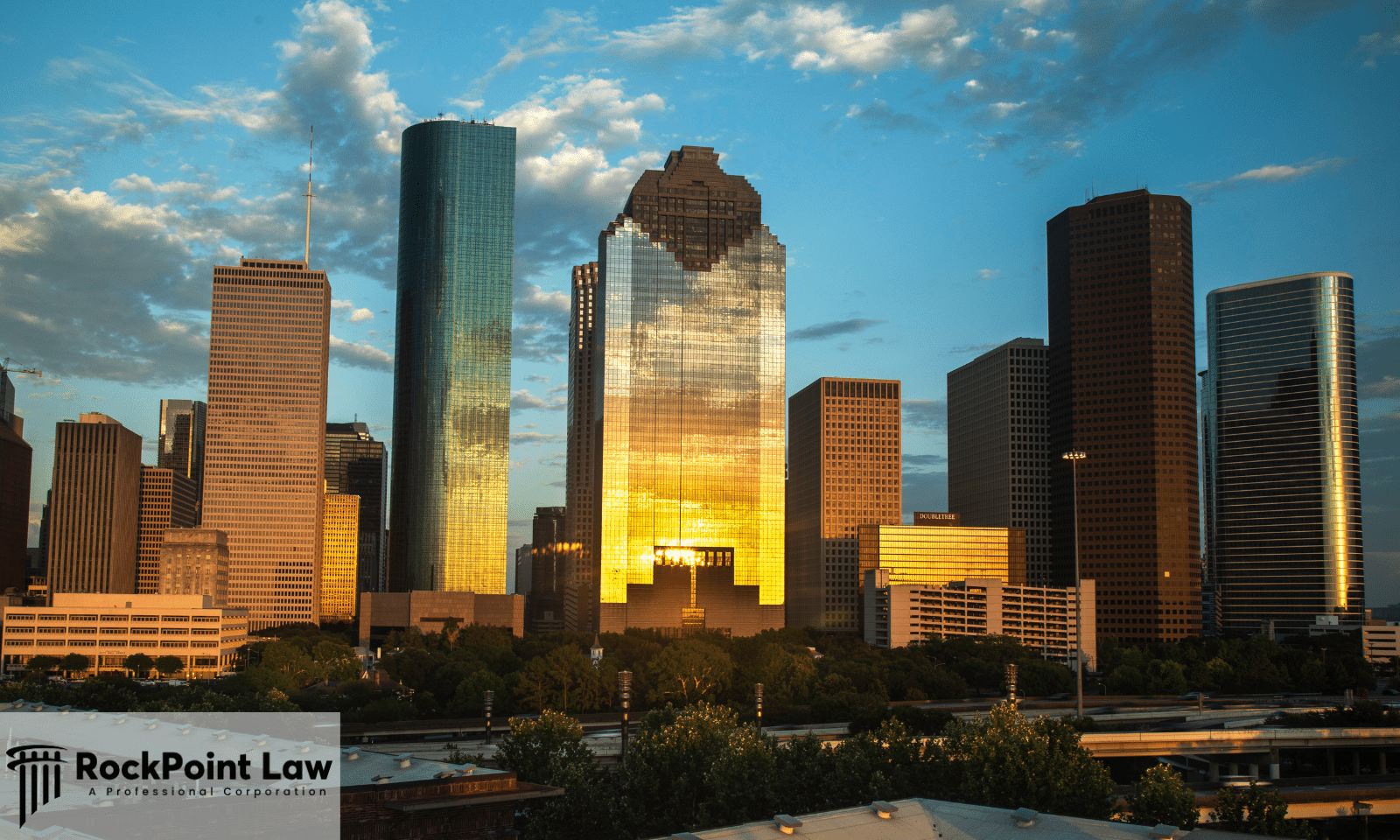 Houston skyline at sunset, where Texas lemon law protects new vehicle buyers and lessees