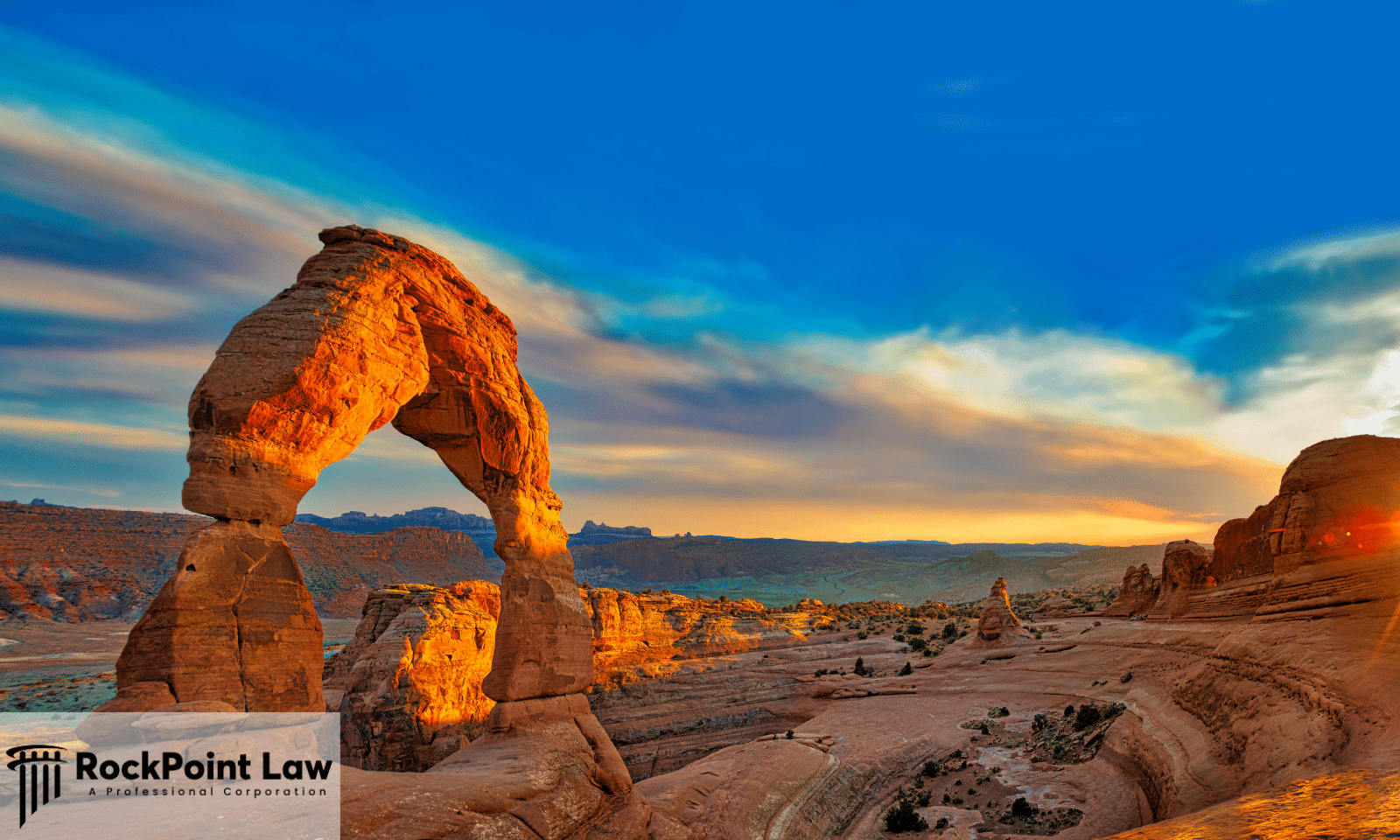 Delicate Arch in Arches National Park at sunset, where Utah lemon law protects new vehicle buyers and lessees